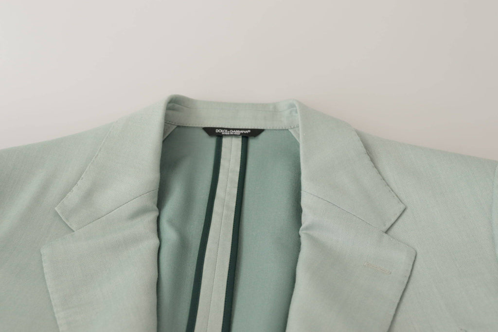 Veste blazer en cachemire vert de Dolce & Gabbana, élégante et élégante, avec coupe classique et détails sophistiqués.