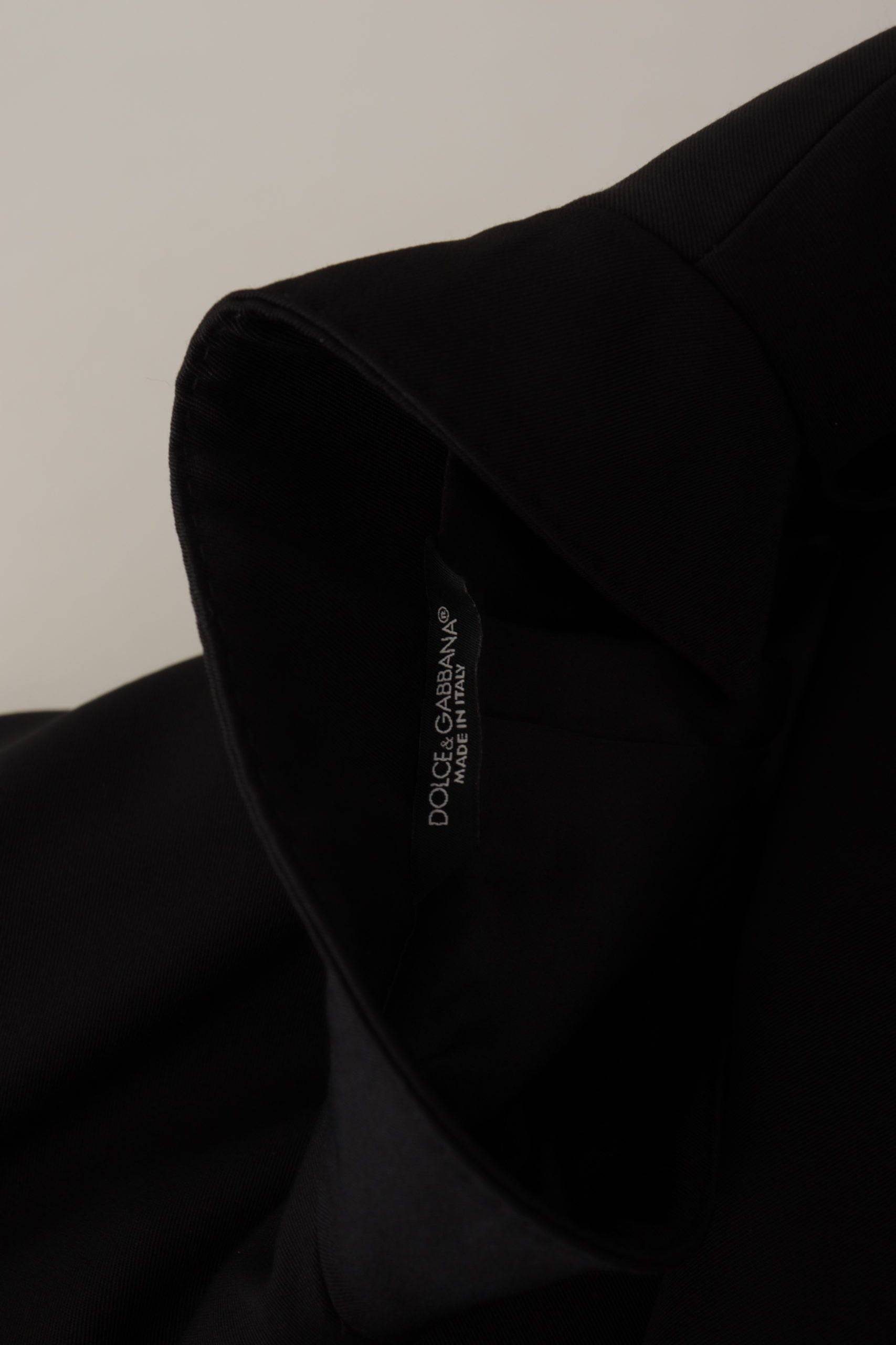 Veste blazer en laine noire Dolce & Gabbana à boutonnière simple, mode élégante et sophistiquée, vue de face.