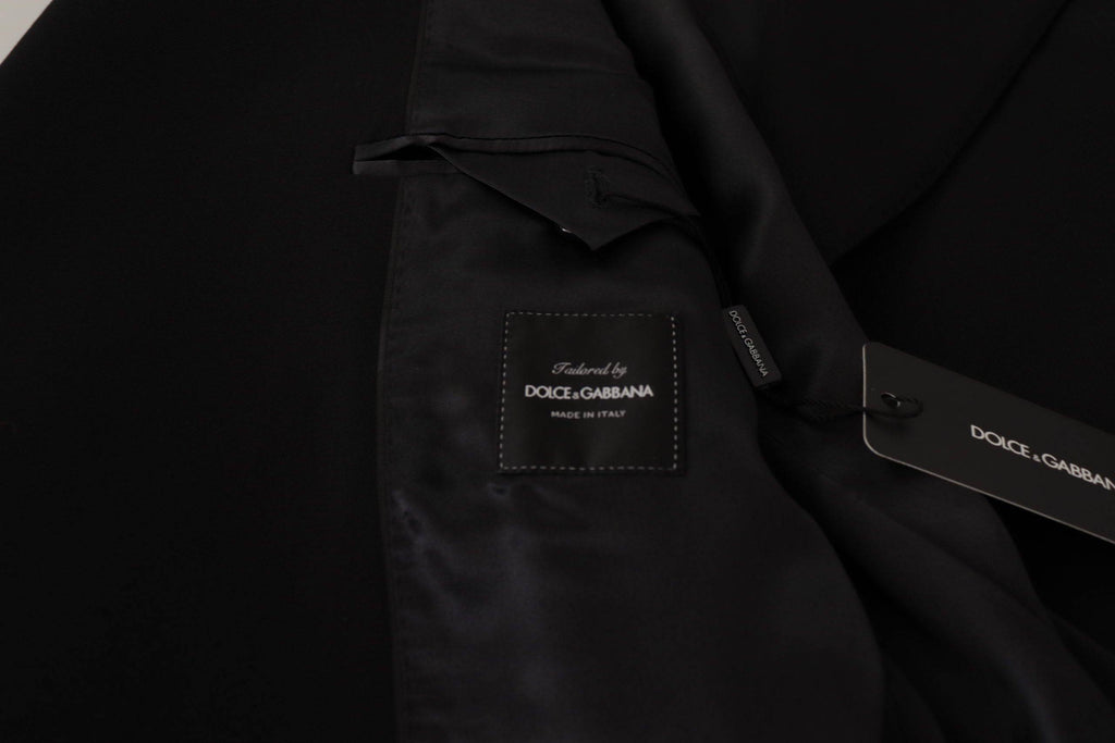 Veste blazer en laine noire Dolce & Gabbana à double boutonnage, élégante et sophistiquée, vue de face sur un mannequin.