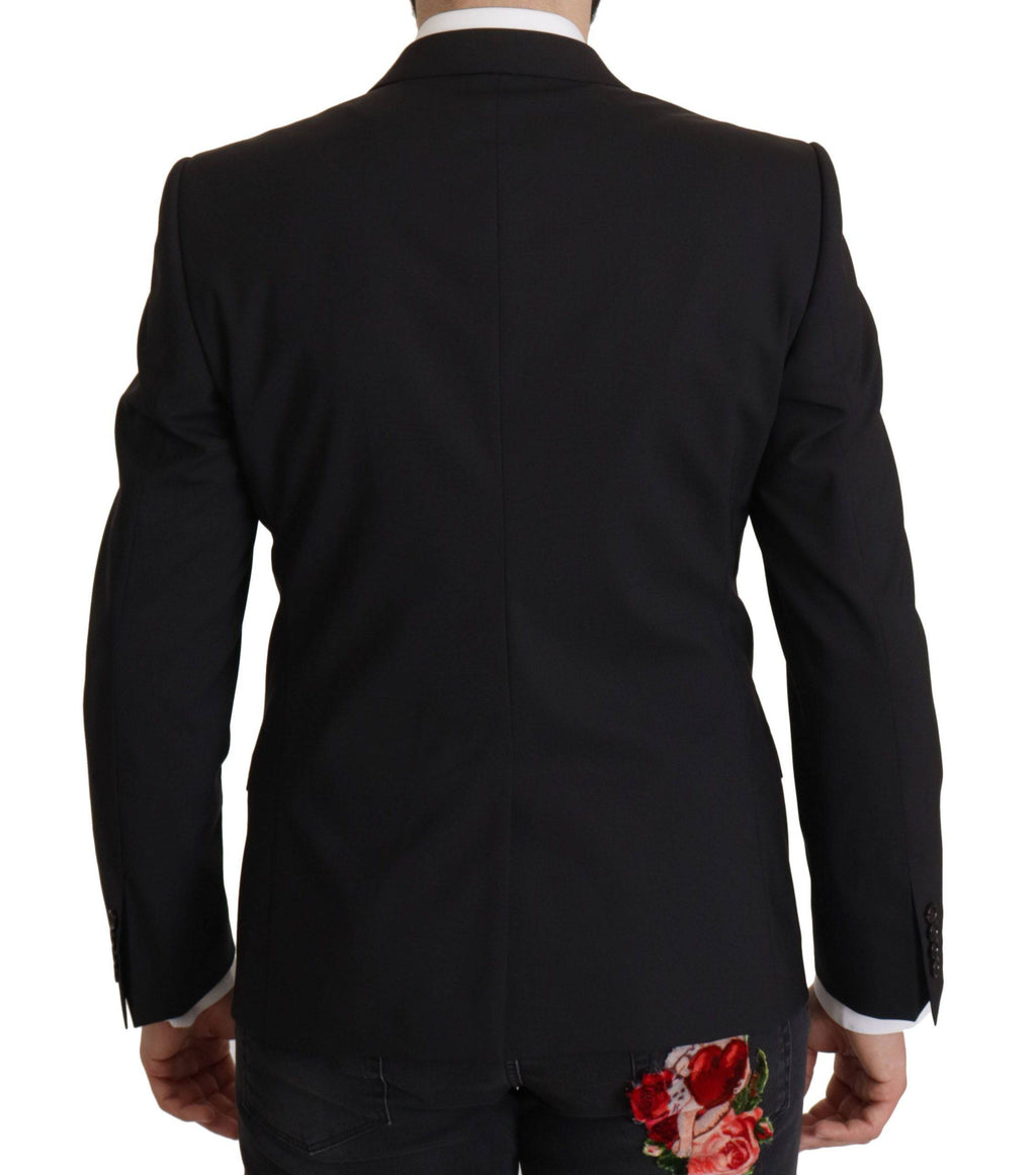 Veste noire Dolce & Gabbana Martini blazer à un seul bouton, coupe élégante et tissu de qualité, portée sur un mannequin.