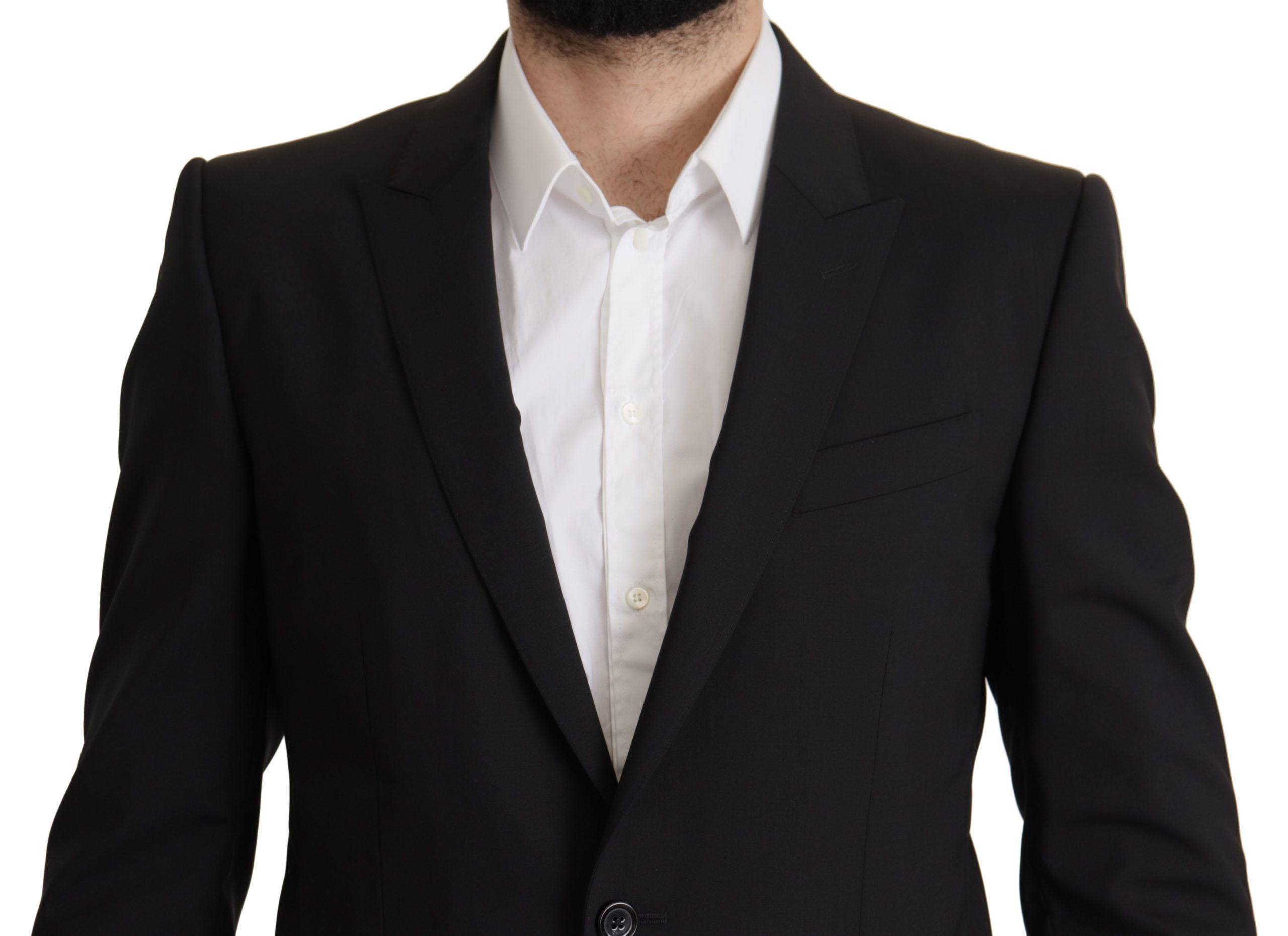 Veste noire Dolce & Gabbana Martini blazer à fermeture simple, tissu élégant, coupe classique et style sophistiqué.