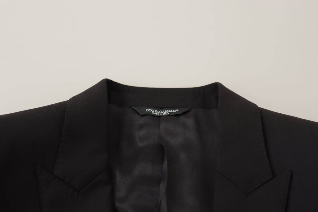 Veste blazer noire à un bouton Dolce & Gabbana Martini, coupe classique et élégante, portée pour un style sophistiqué.