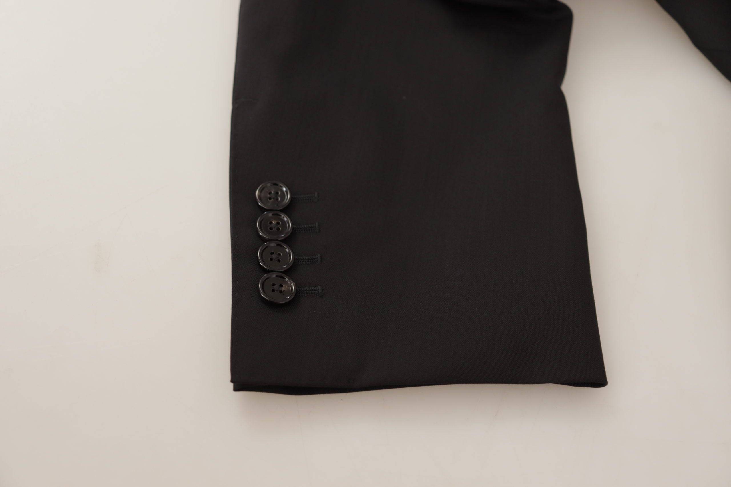 Veste blazer noire Dolce & Gabbana à un seul bouton, style Martini, en tissu élégant, vue de face sur fond neutre.