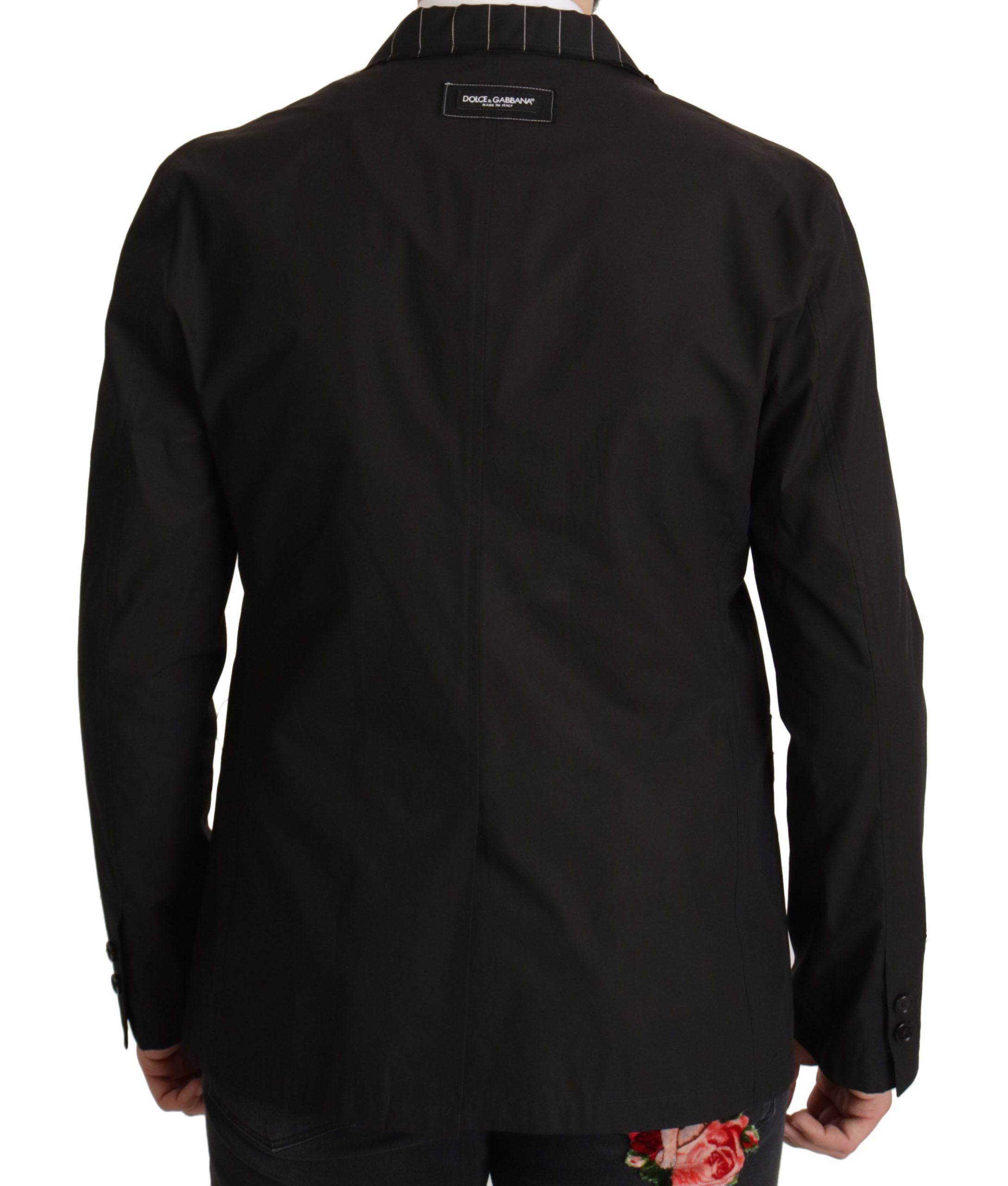Veste blazer noire en coton Dolce & Gabbana, coupe simple boutonnage, style élégant et classique, vue de face.