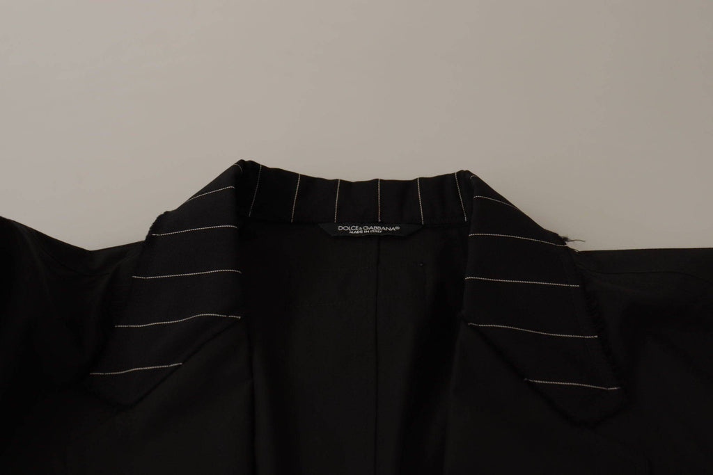 Veste blazer noire en coton Dolce & Gabbana, coupe classique à un bouton, détail simple et élégant.