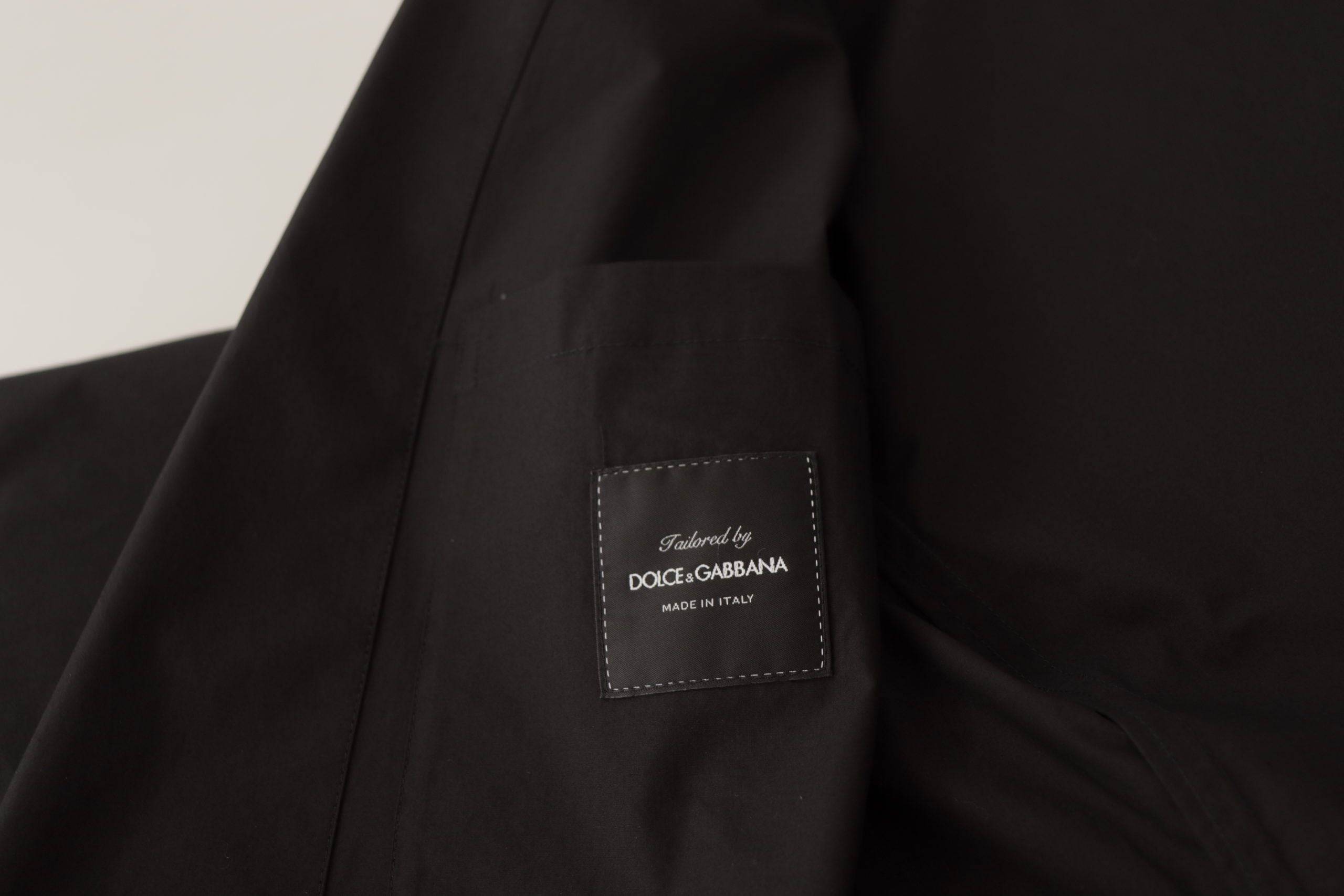 Veste blazer noir en coton de Dolce & Gabbana, à boutons sur le devant, élégante et classique.