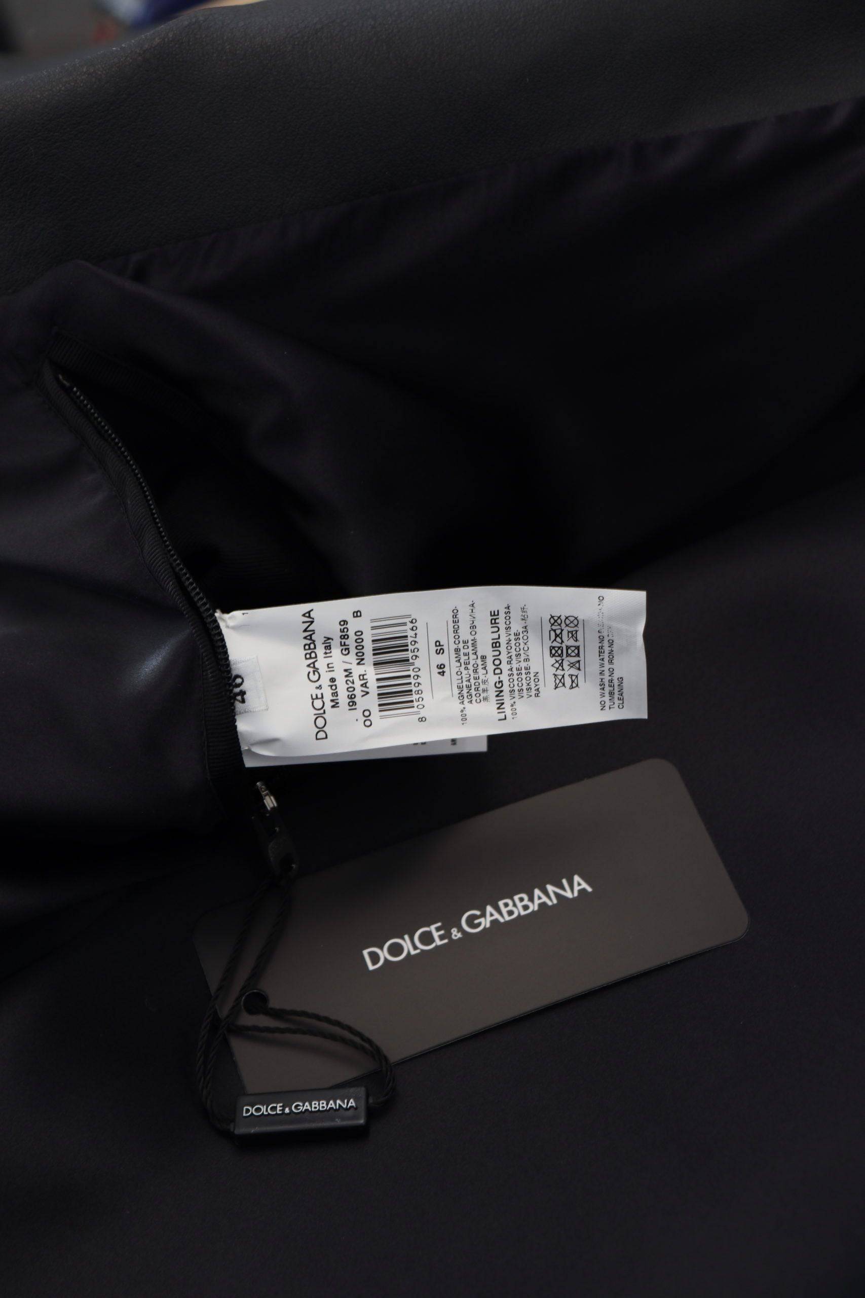 Veste en cuir noir de style motard de Dolce & Gabbana avec fermeture éclair, détails en cuir et coupe ajustée.