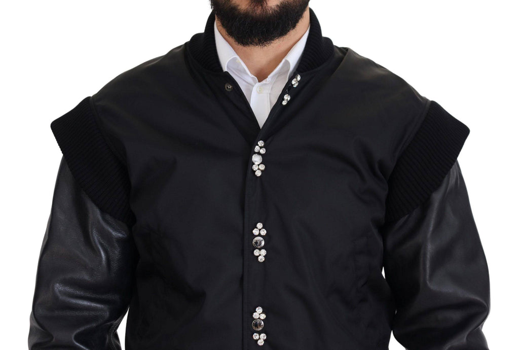 Veste noire en nylon Dolce & Gabbana avec boutons ornés de cristaux, style élégant et moderne.