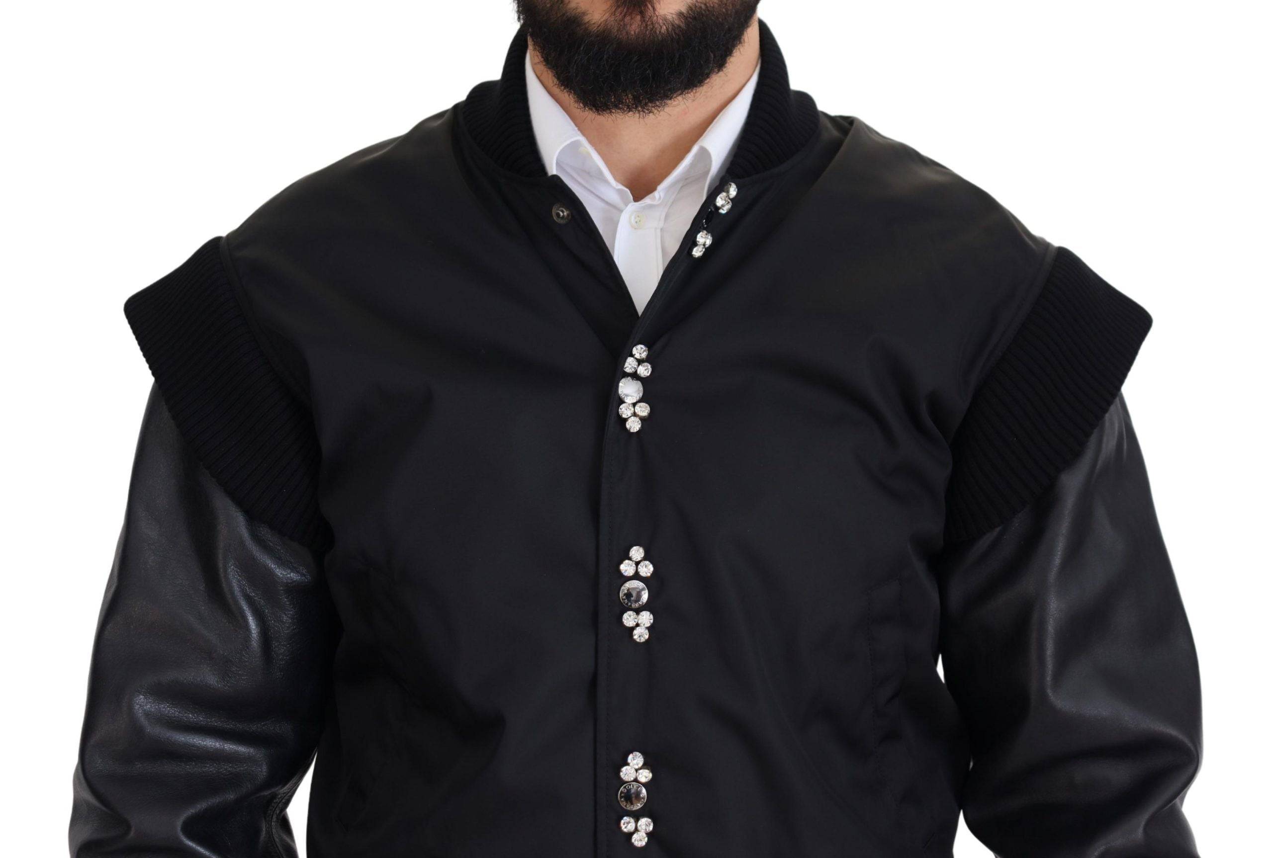 Veste noire en nylon Dolce & Gabbana avec boutons ornés de cristaux, style élégant et moderne.