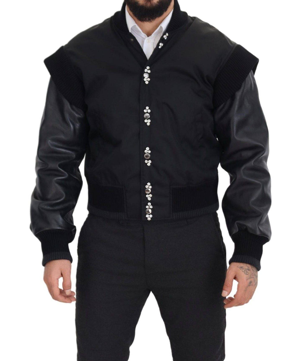 Veste en nylon noir Dolce & Gabbana avec boutons ornés de cristaux, style élégant et moderne.