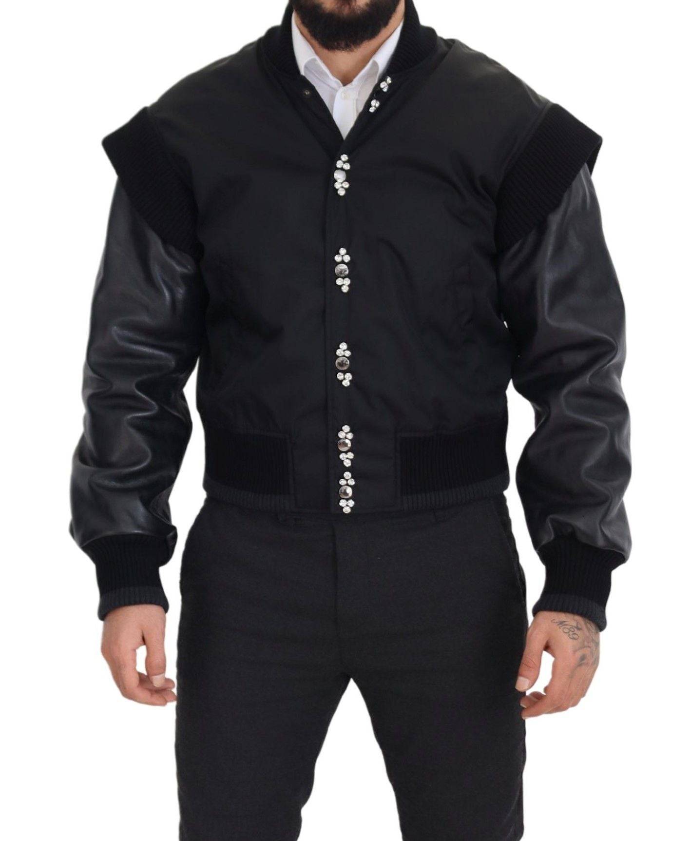 Veste en nylon noir Dolce & Gabbana avec boutons ornés de cristaux, style élégant et moderne.