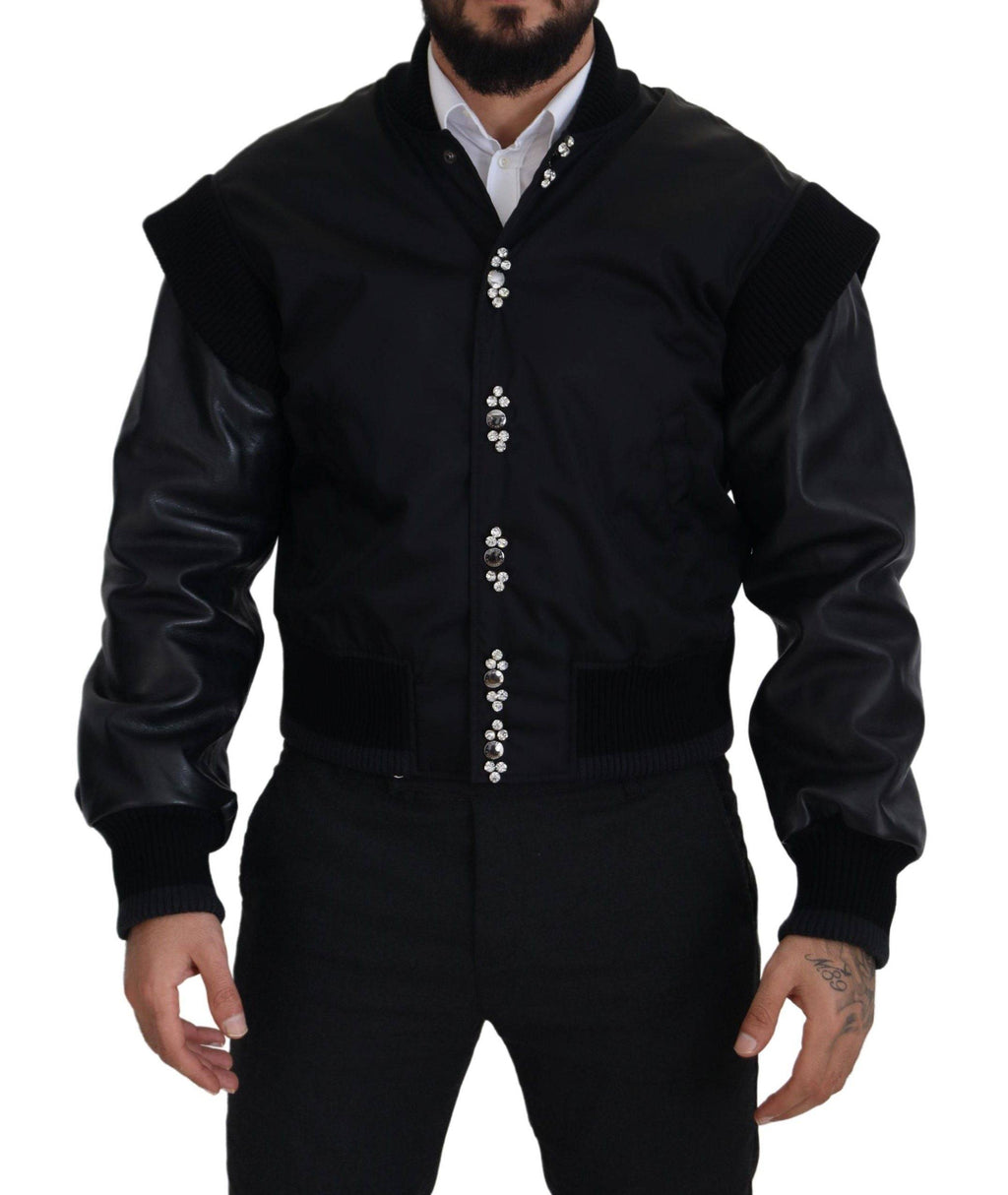 Veste Dolce & Gabbana en nylon noir avec boutons ornés de cristaux, style élégant et moderne.