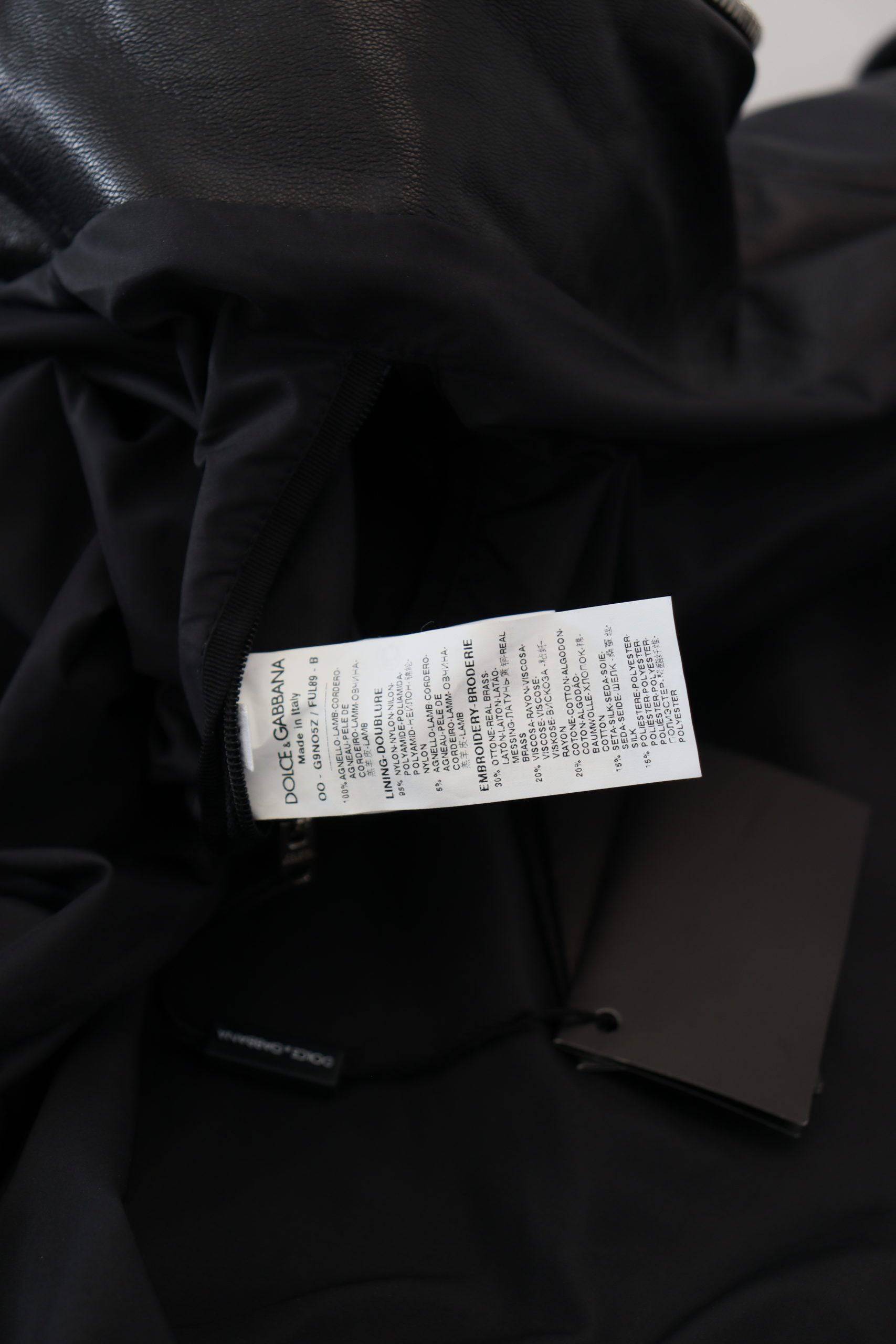 Veste blouson noire en cuir avec capuche de Dolce & Gabbana, style élégant et moderne, visible en image.