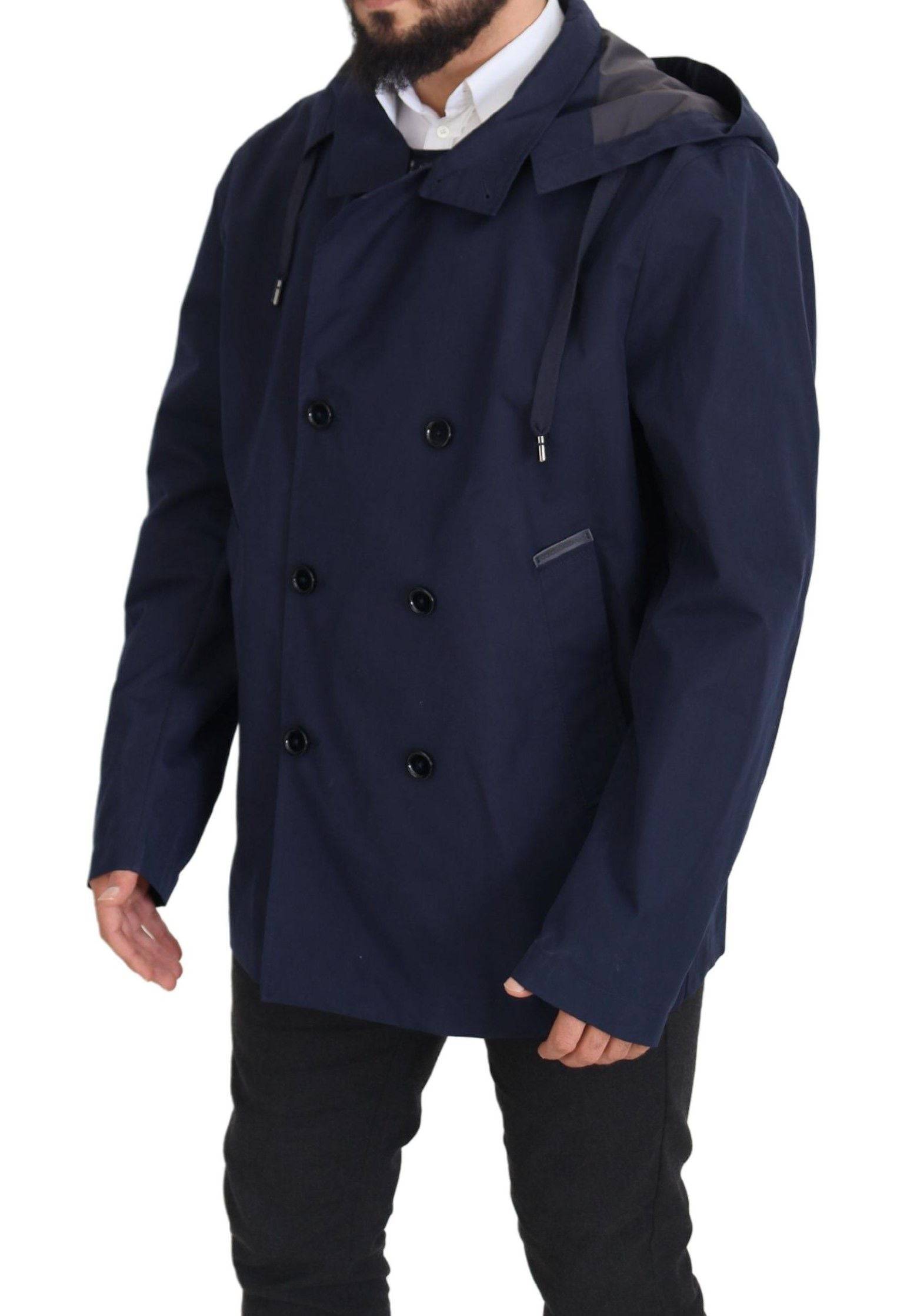 Manteau doublé à capuche bleu Dolce & Gabbana, coupe élégante, avec boutons croisés et détails sophistiqués.
