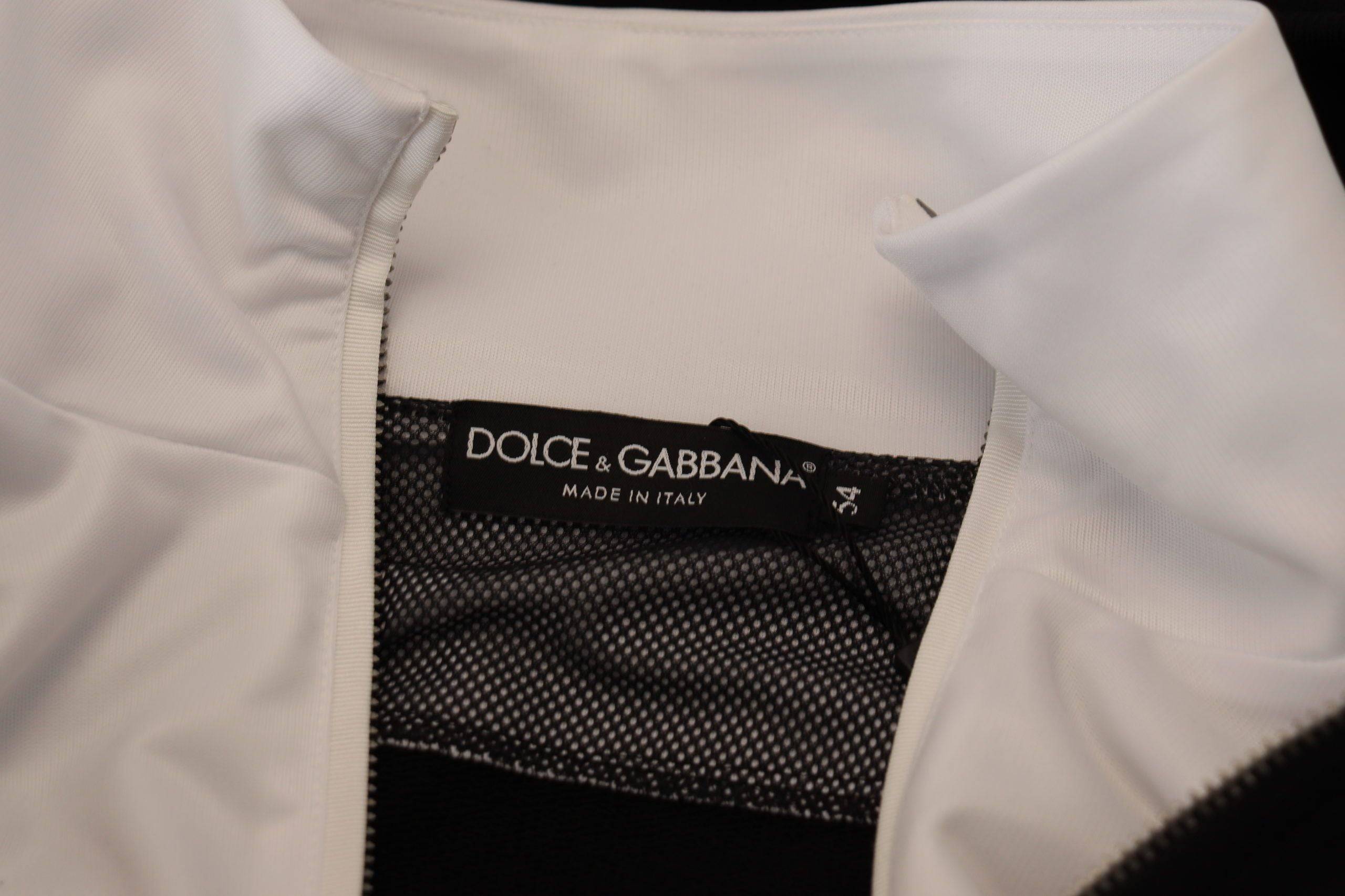 Veste noire en polyester avec capuche et fermeture éclair complète, fabriquée par Dolce & Gabbana.