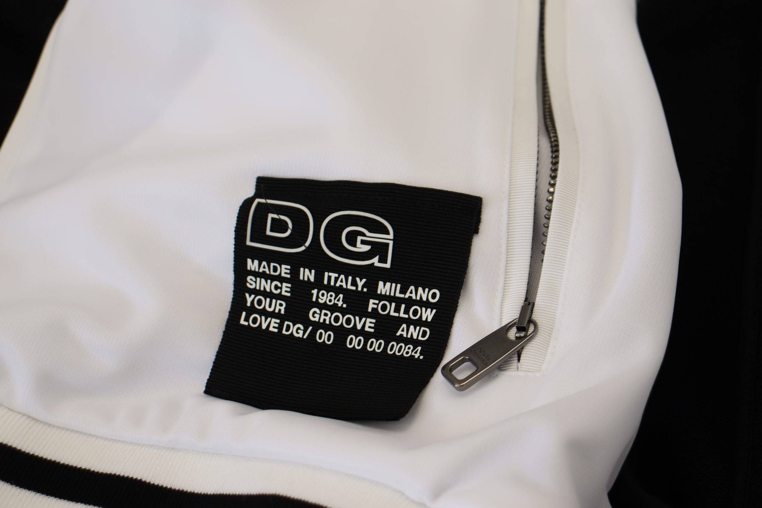 Veste noire en polyester à capuche et zip complet de Dolce & Gabbana, style décontracté et moderne.