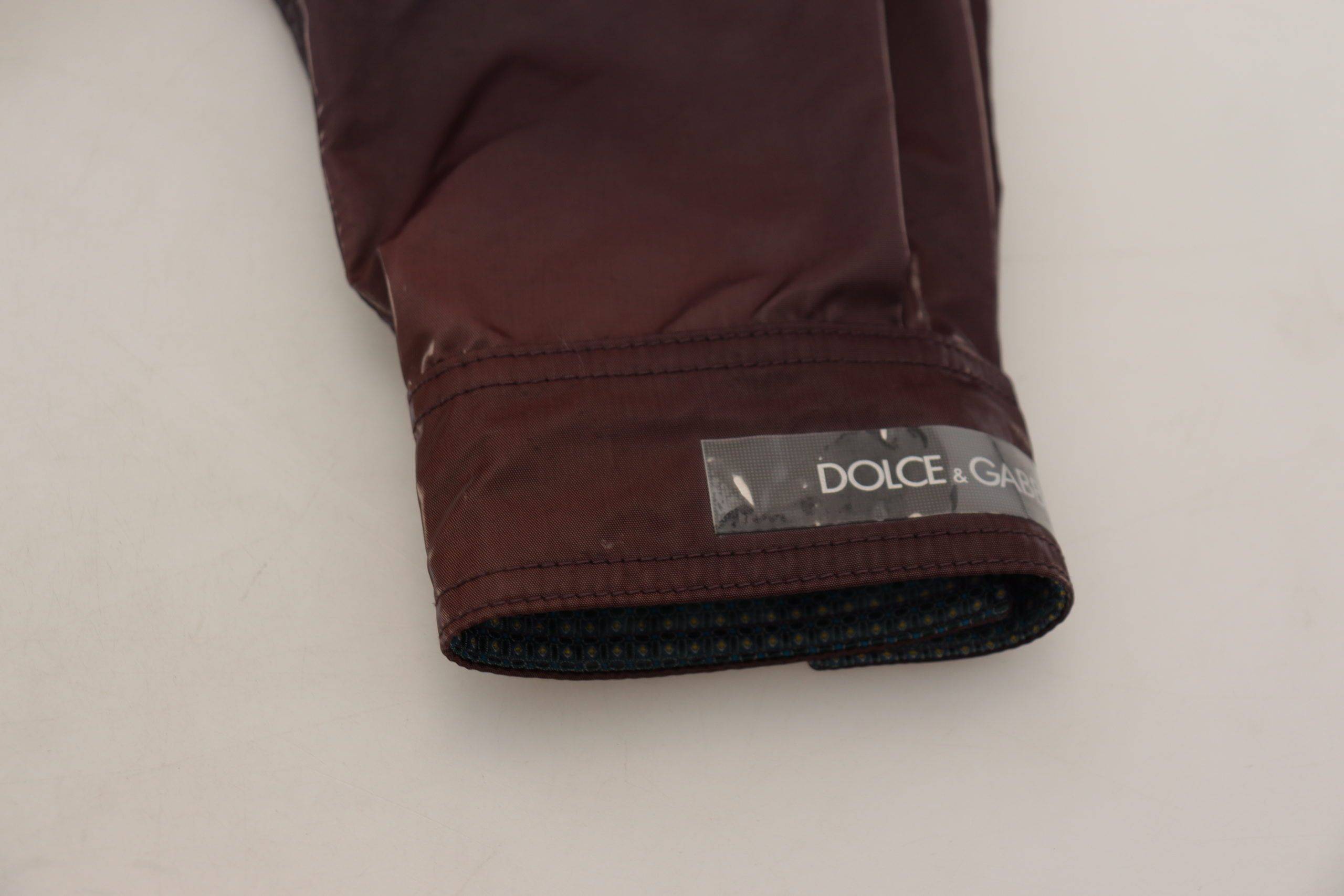 Veste manteau de motard en nylon violet Dolce & Gabbana avec col, style élégant et moderne.