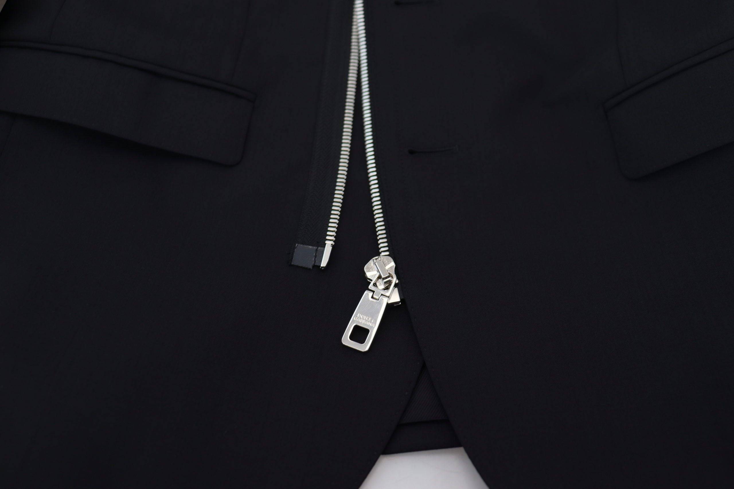 Veste en laine noire Dolce & Gabbana à manches longues avec fermeture éclair complète, élégante et confortable.