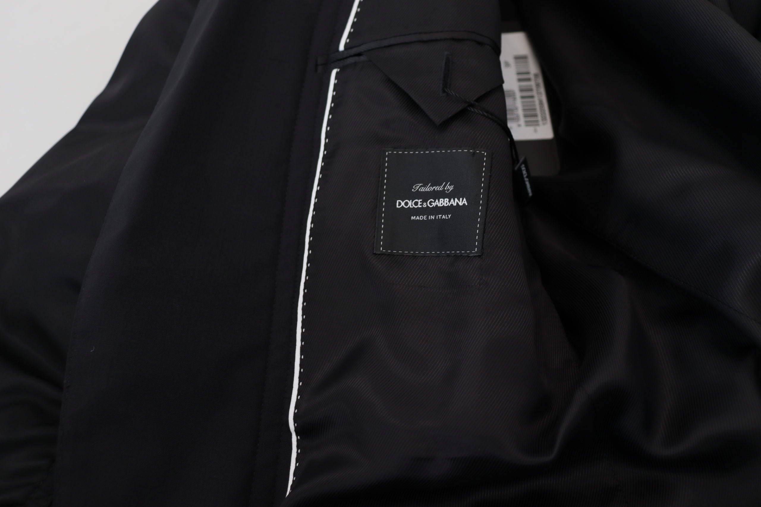 Veste en laine noire Dolce & Gabbana à manches longues avec fermeture éclair intégrale, style élégant et moderne.