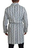 Robe-coat en coton bleu à fleurs Dolce & Gabbana, vêtement élégant avec motif floral et coupe décontractée.