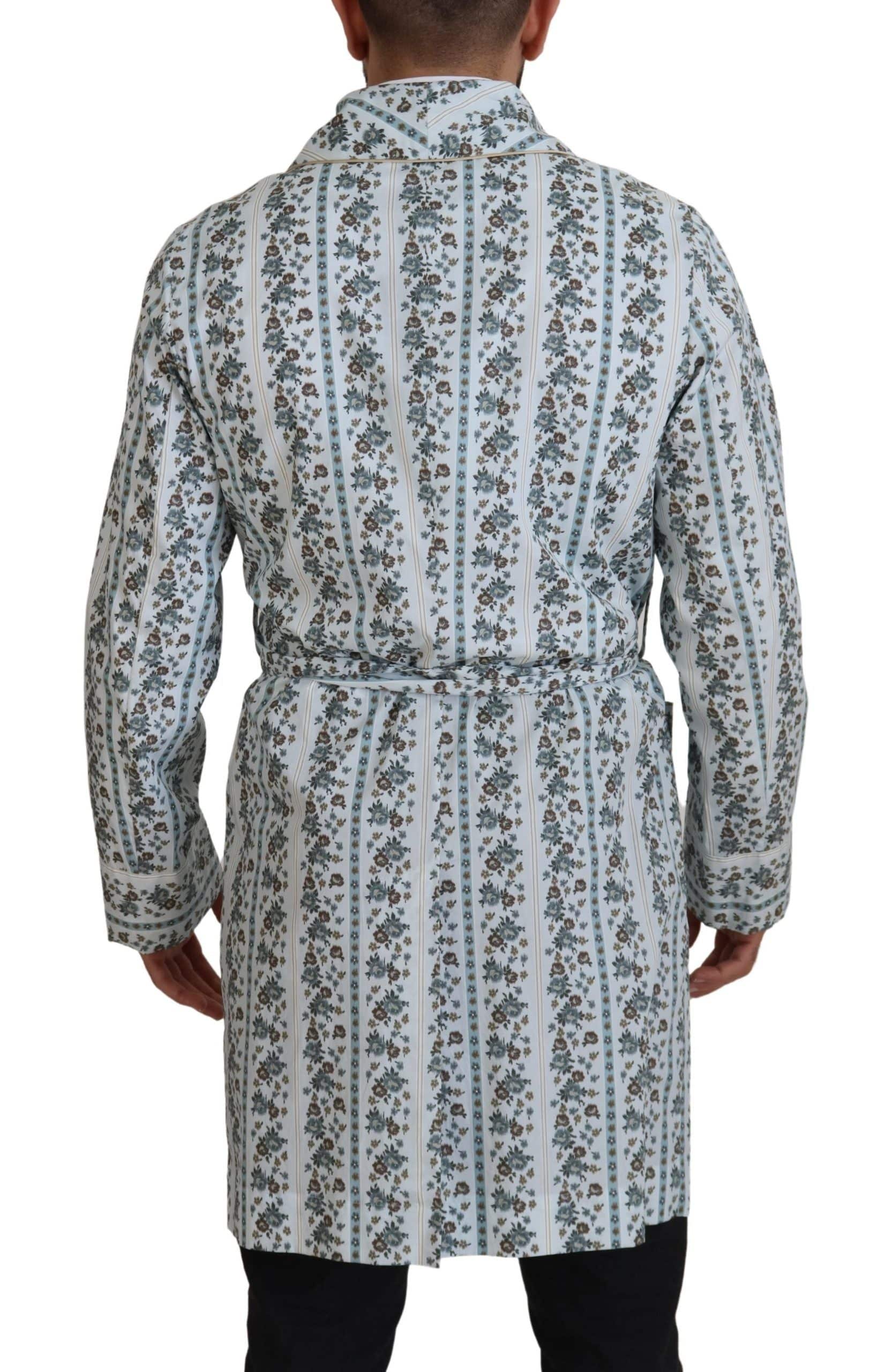 Robe-coat en coton bleu à fleurs Dolce & Gabbana, vêtement élégant avec motif floral et coupe décontractée.