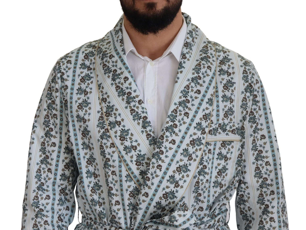 Robe-coat en coton à fleurs bleues Dolce & Gabbana, vêtement élégant avec détails floraux, porté sur un mannequin.