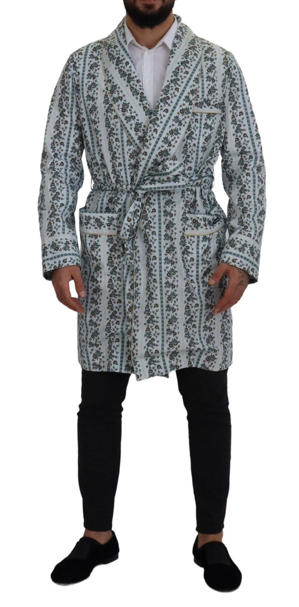 Robe-coat en coton bleu à motifs floraux Dolce & Gabbana, vêtement élégant avec détails floraux visibles.