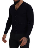 Pull Dolce & Gabbana en laine bleue avec col cheminée et boutons, cardigan homme élégant en laine bleue.