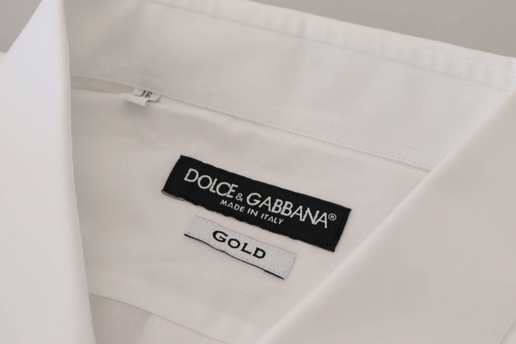 Chemise formelle blanche en coton Dolce & Gabbana avec motif paon doré, élégante et raffinée, visible en gros plan.