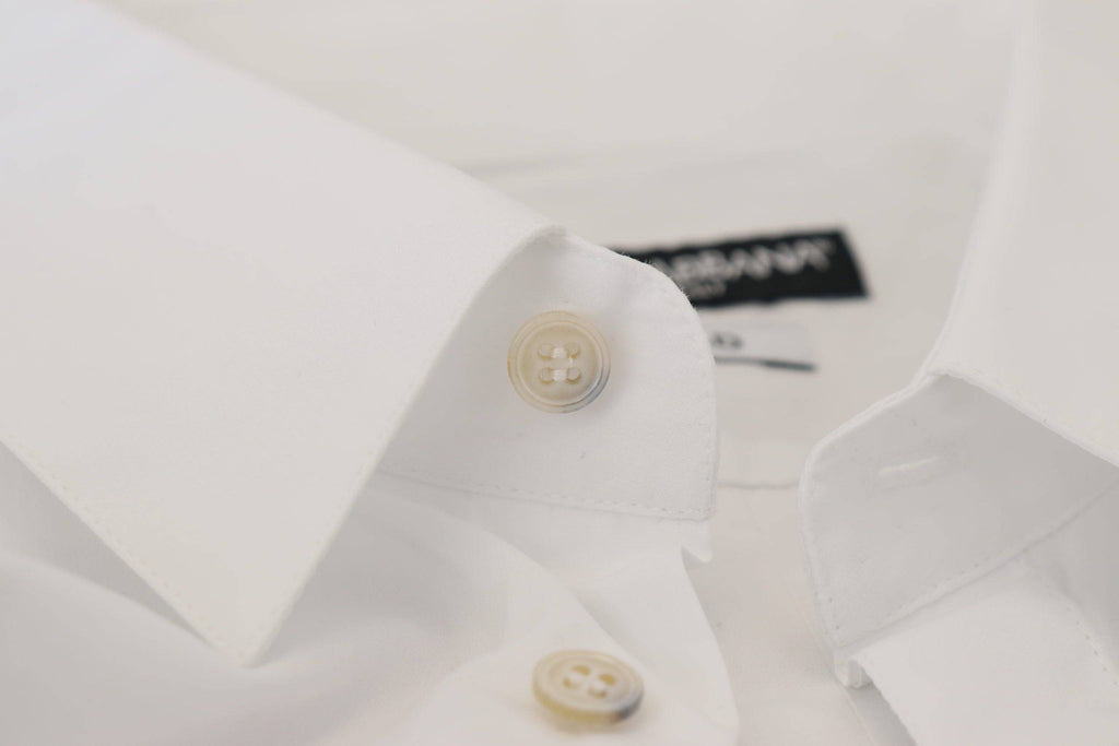 Chemise formelle blanche Dolce & Gabbana en coton avec motif de paon doré et détails élégants.