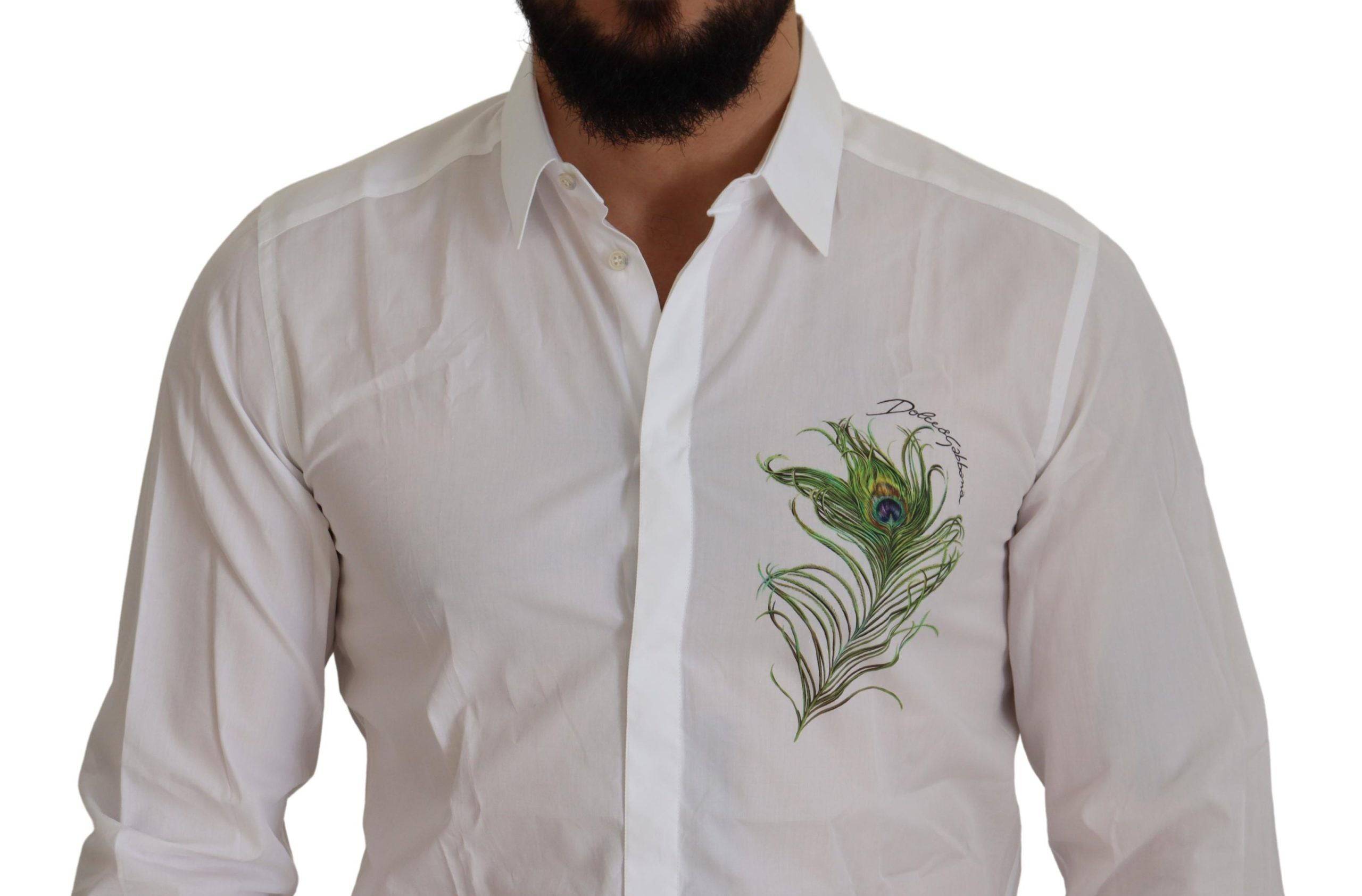 Chemise formelle blanche Dolce & Gabbana en coton avec motif de paon doré et détails élégants.