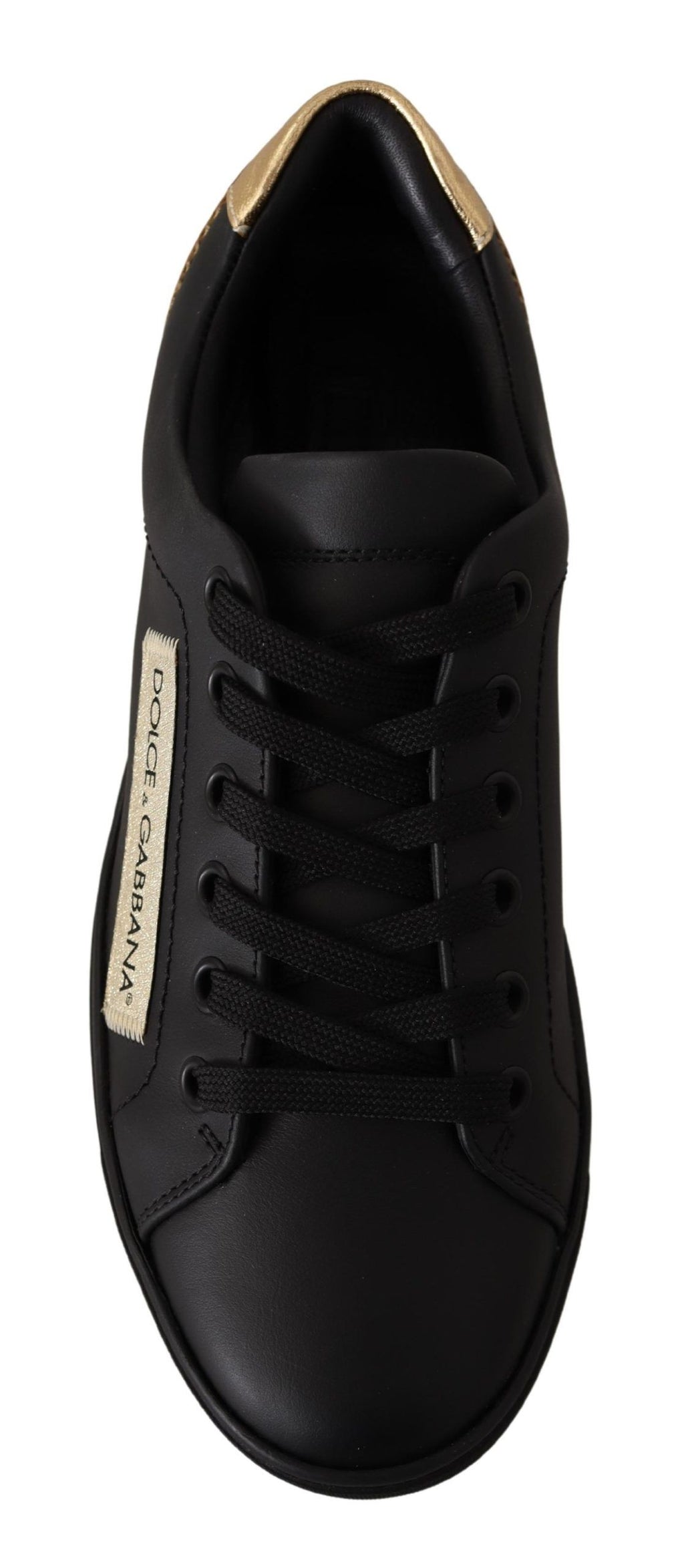 Sneakers bass en cuir noir et or pour femmes de Dolce & Gabbana, chaussures élégantes avec logo doré.