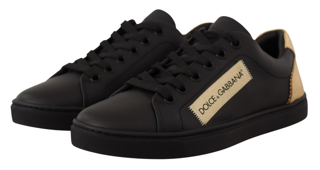 Chaussures femme Dolce & Gabbana sneakers basses en cuir noir avec détails dorés.