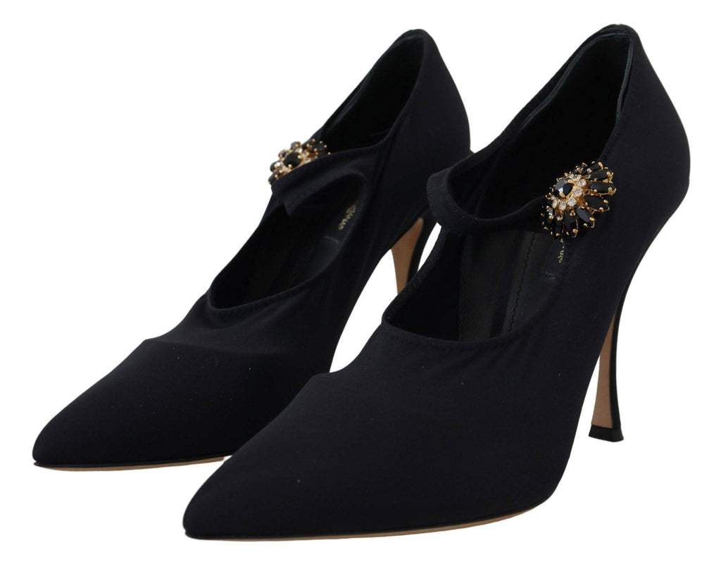 Chaussettes noires Dolce & Gabbana avec cristaux, associées à des escarpins en stretch pour un look élégant et sophistiqué.