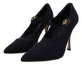 Chaussettes noires Dolce & Gabbana avec cristaux, associées à des escarpins en stretch pour un look élégant et sophistiqué.