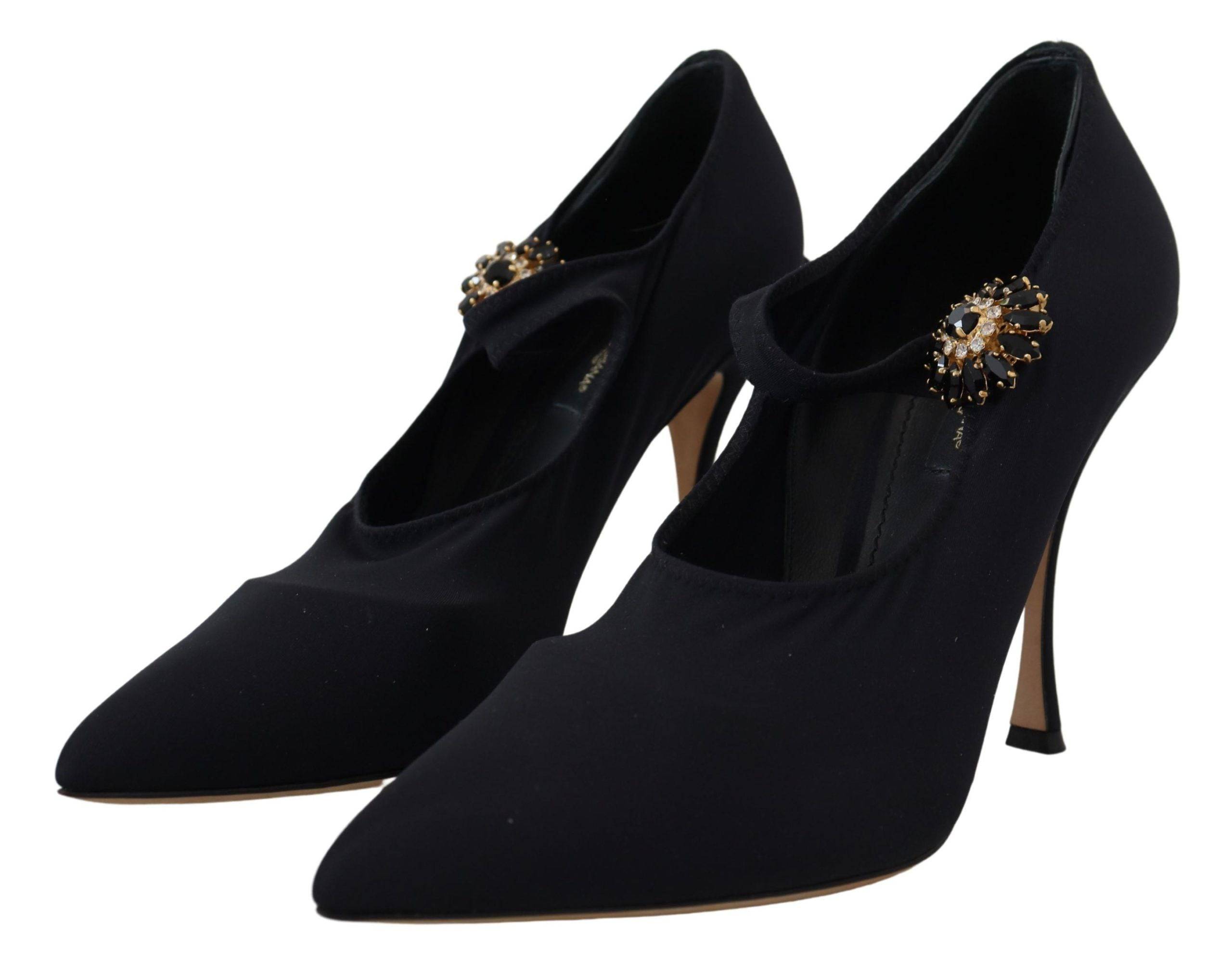 Chaussettes noires Dolce & Gabbana avec cristaux, associées à des escarpins en stretch pour un look élégant et sophistiqué.