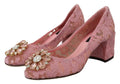 Chaussures pastel Dolce & Gabbana Taormina en dentelle et cristaux roses, pompes élégantes en cuir avec talons hauts.