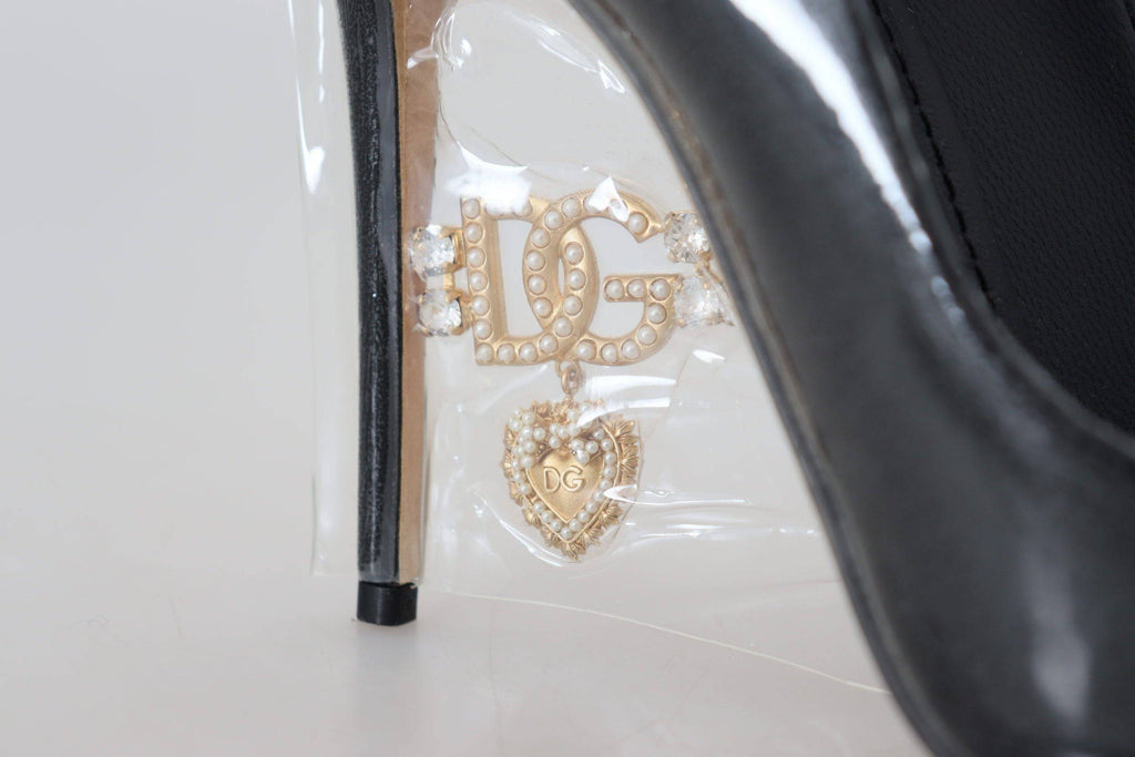 Escarpins en cuir noir de Dolce & Gabbana avec emballage plastique, talons élégants et design sophistiqué.