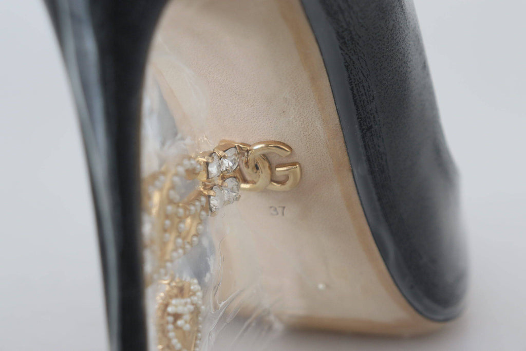 Escarpins noirs en cuir Dolce & Gabbana avec semelle en plastique, élégants et sophistiqués pour femmes.