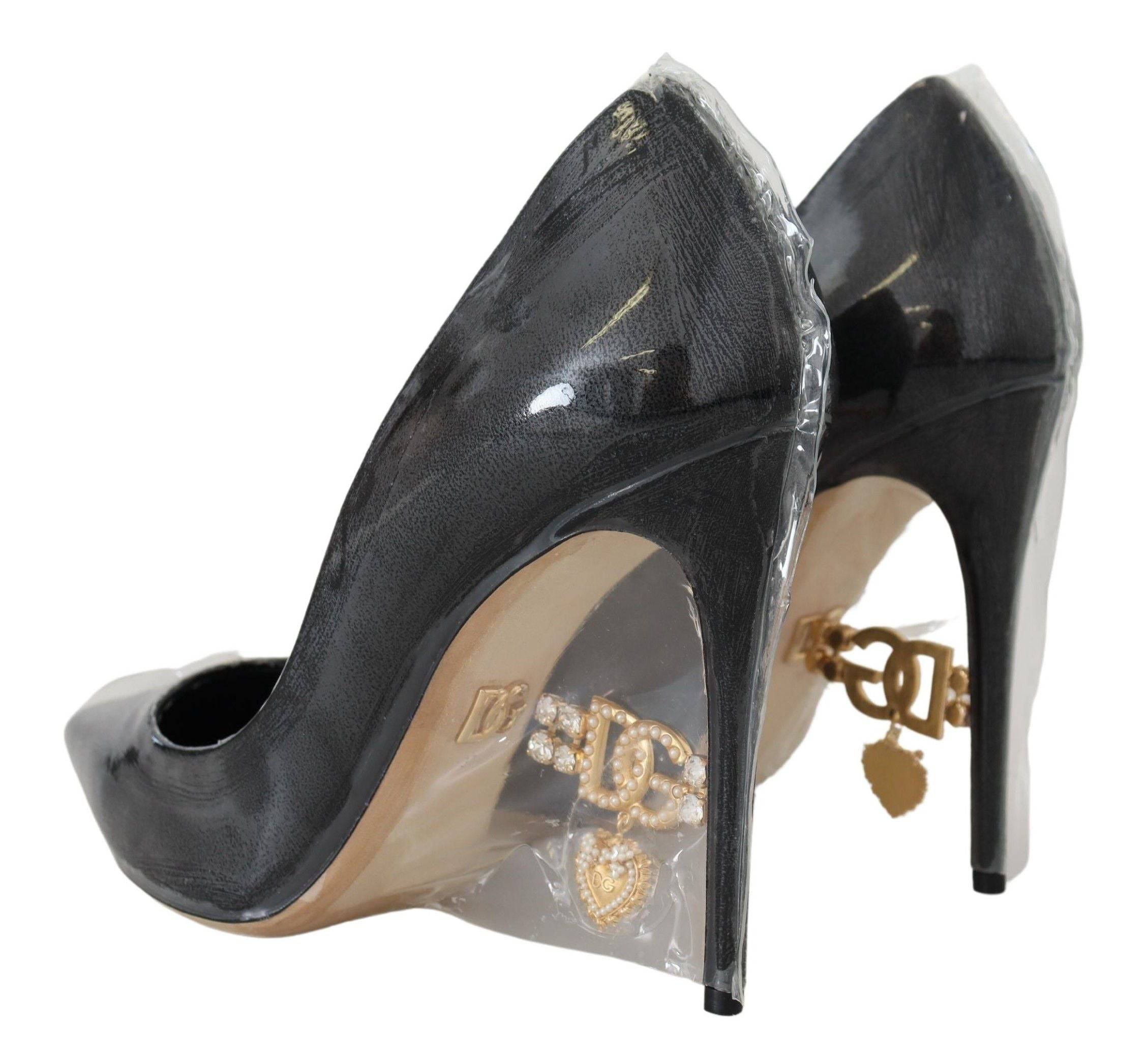 Escarpins en cuir noir Dolce & Gabbana, talons hauts, chaussures à emballage plastique, élégantes et sophistiquées.