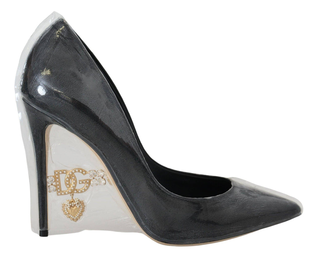 Escarpins en cuir noir de la marque Dolce & Gabbana avec emballage plastique, élégants et sophistiqués pour femmes.