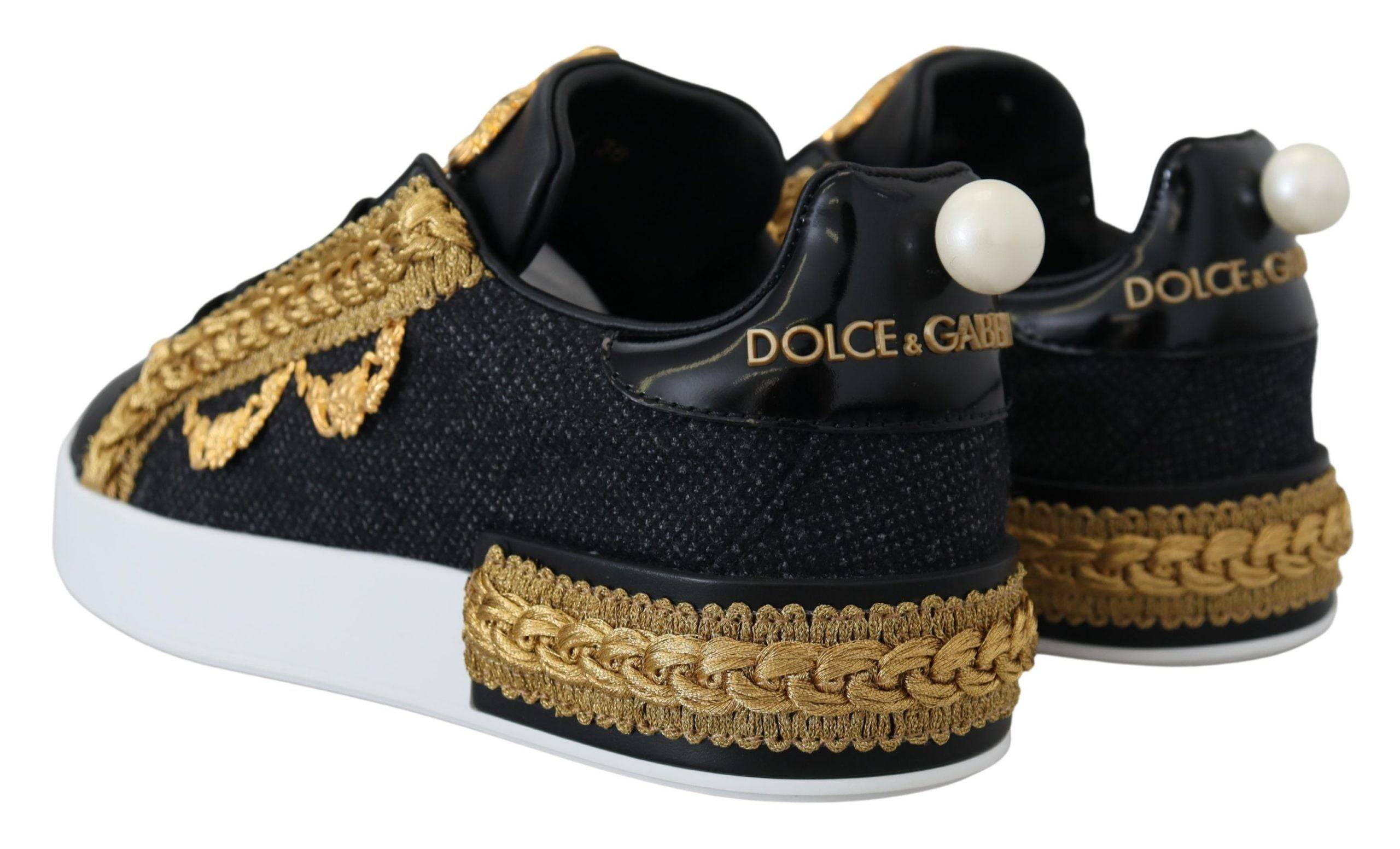 Chaussures sneakers Dolce & Gabbana Portofino en cuir noir avec détails dorés baroque, style élégant et sophistiqué.