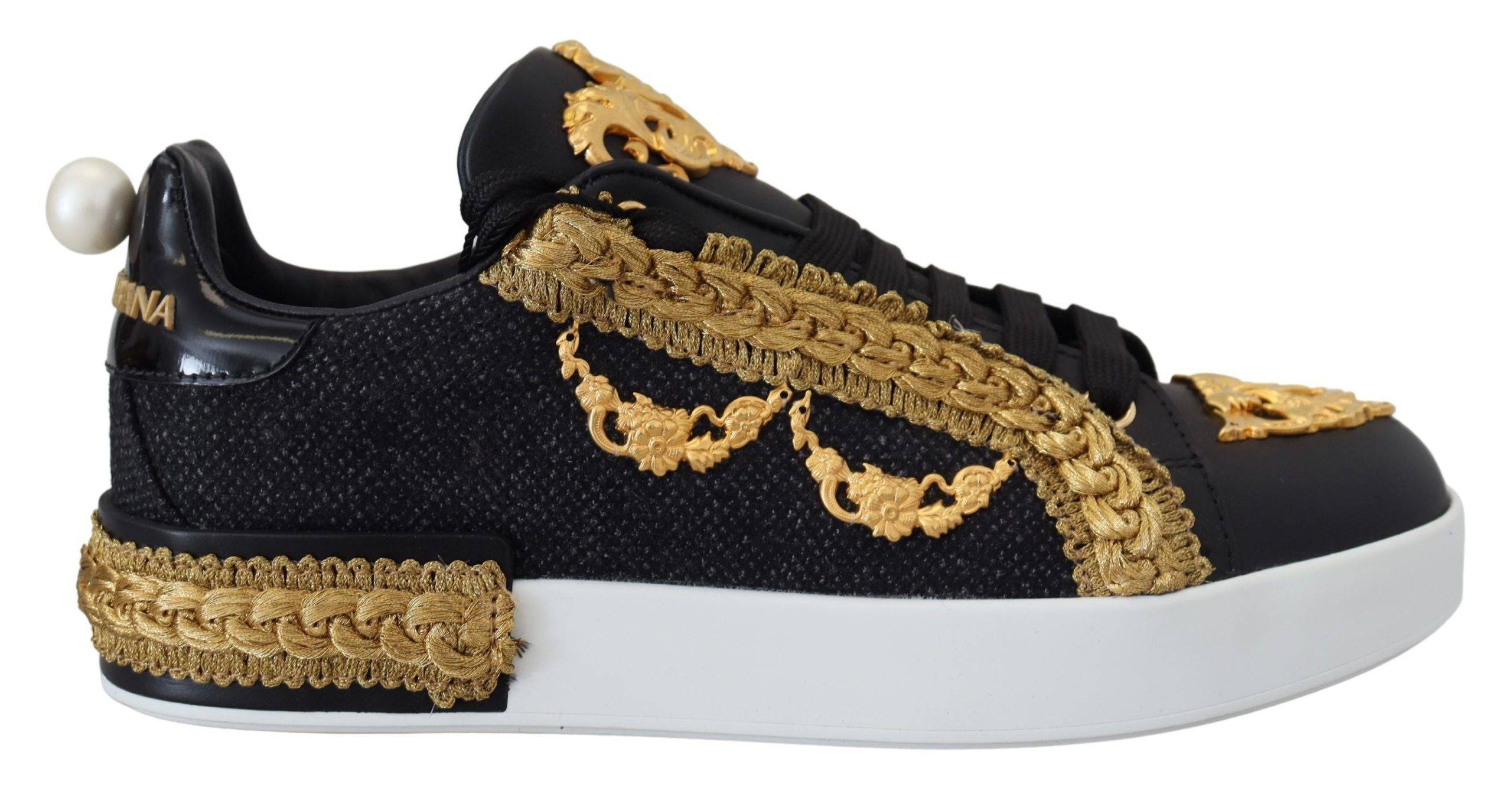 Chaussures sneakers portofino en cuir noir et or avec motif baroque de Dolce & Gabbana, style élégant et sophistiqué.