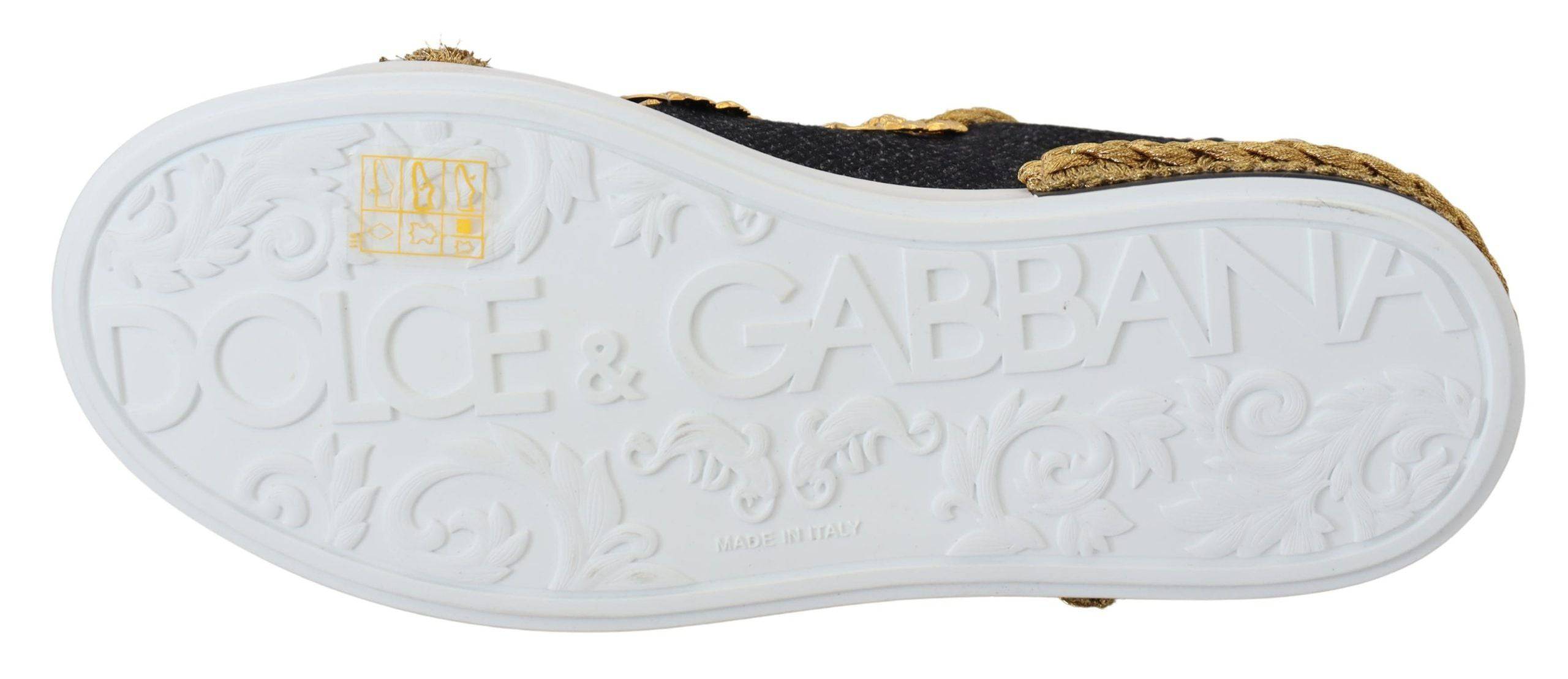 Chaussures sneakers Dolce & Gabbana Portofino en cuir noir et or avec motif baroque, détails élégants et modernes.