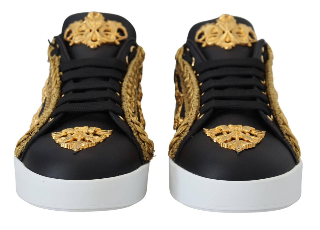 Chaussures sneakers Dolce & Gabbana Portofino en cuir noir avec détails dorés baroque, style élégant et sophistiqué.