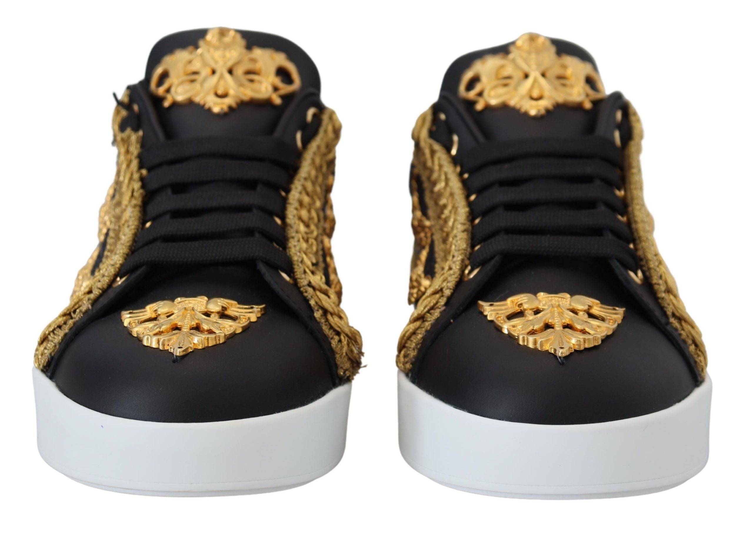 Chaussures sneakers Dolce & Gabbana Portofino en cuir noir avec détails dorés baroque, style élégant et sophistiqué.