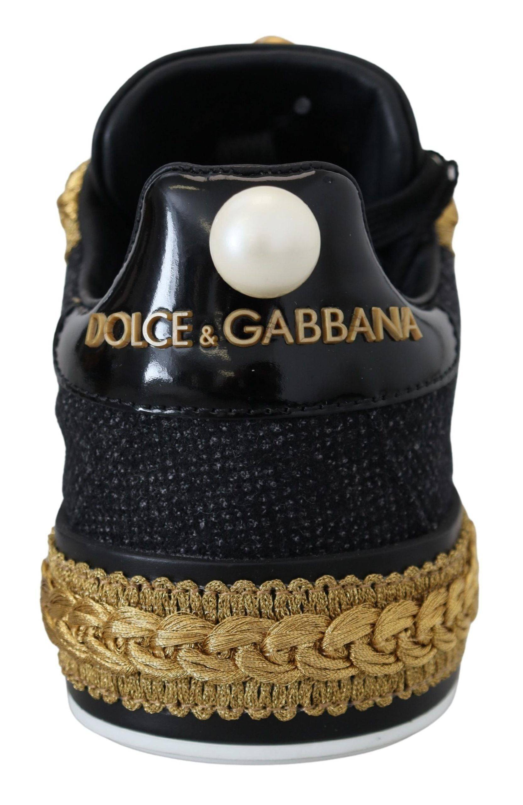 Chaussures Dolce & Gabbana Portofino en cuir noir or baroque, baskets élégantes avec détails luxueux.