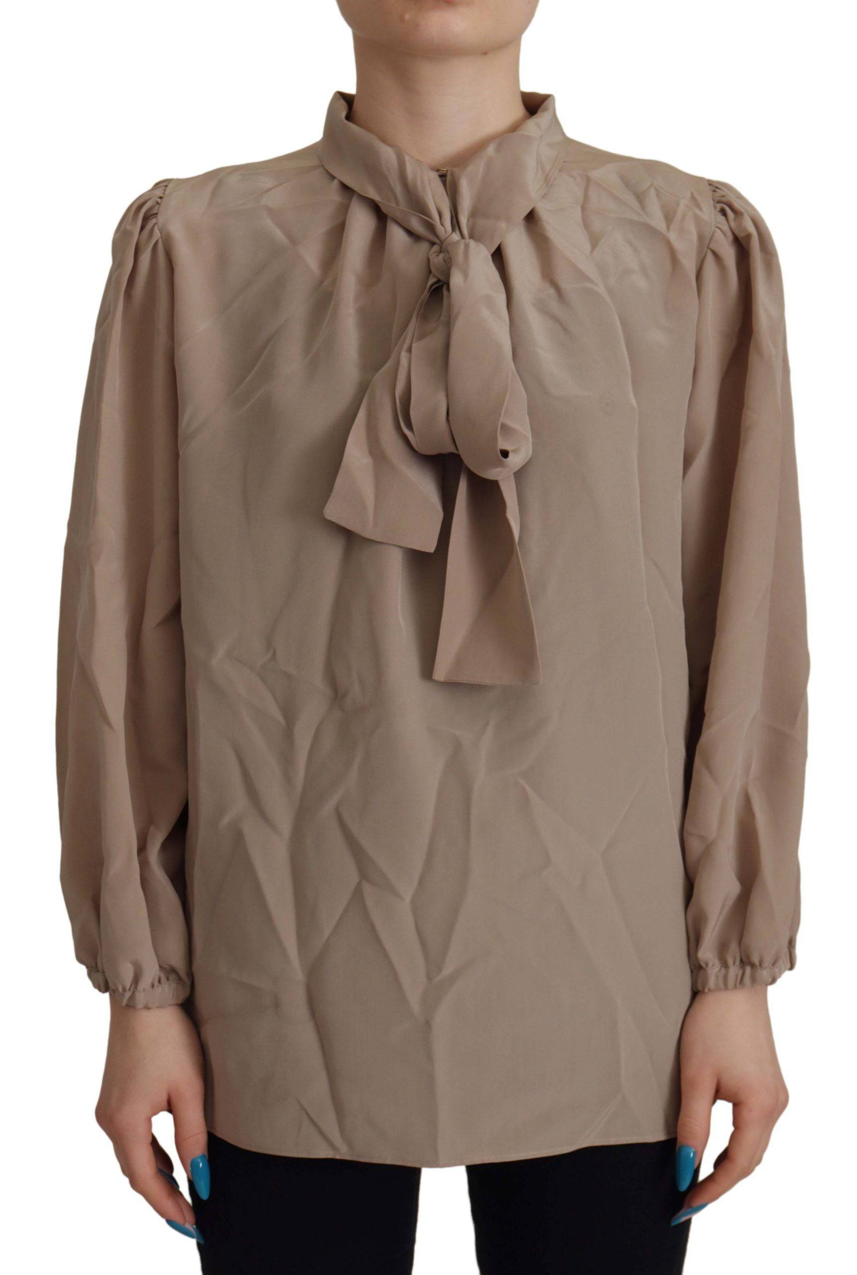 Blouse Dolce & Gabbana avec col ascot, manches à bandeau marron, coupe élégante et détails sophistiqués.