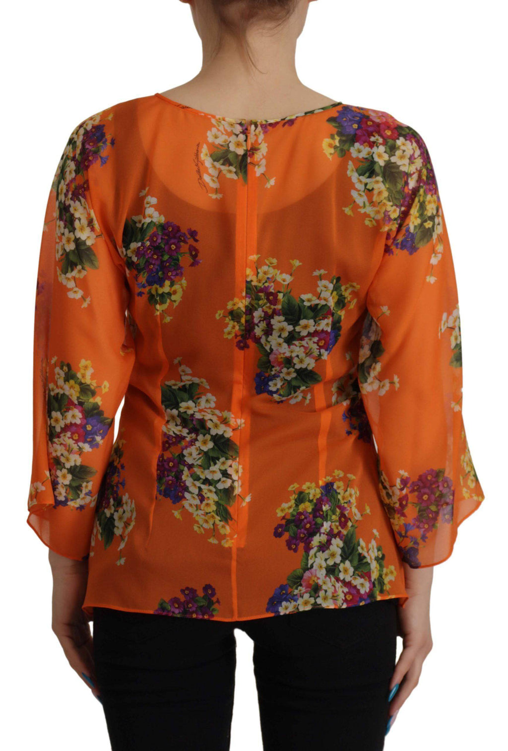 Chemise longue à manches longues Dolce & Gabbana avec imprimé floral orange, tissu léger et élégant.