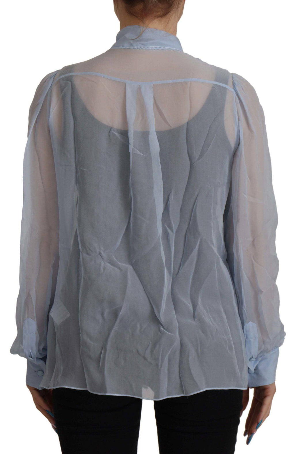 Chemise longue Dolce & Gabbana Light Blue en soie avec col ascot et manches longues, élégante et sophistiquée.